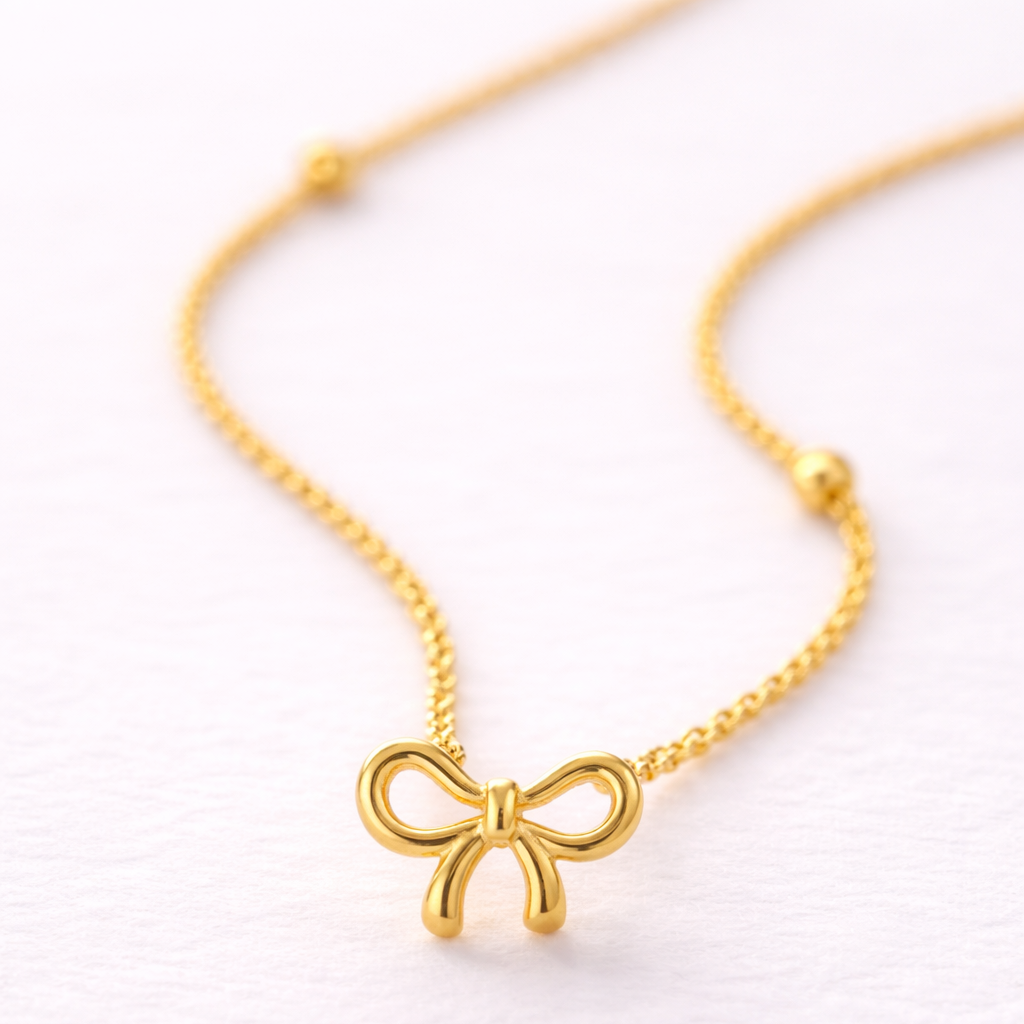 Minimal Bow Necklace: Anti-tarnish gold plated.