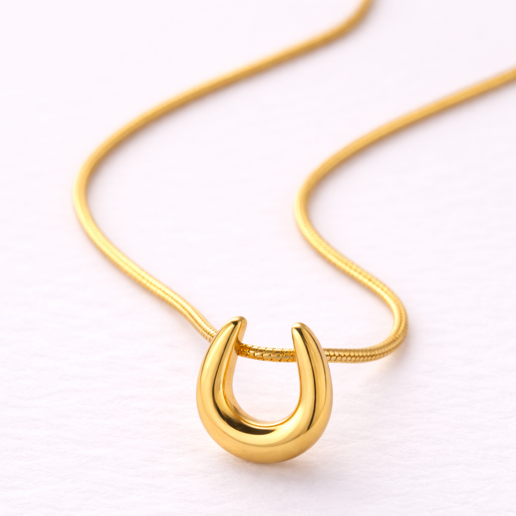 The Golden Arc Pendant Necklace:  Anti-tarnish gold plated.