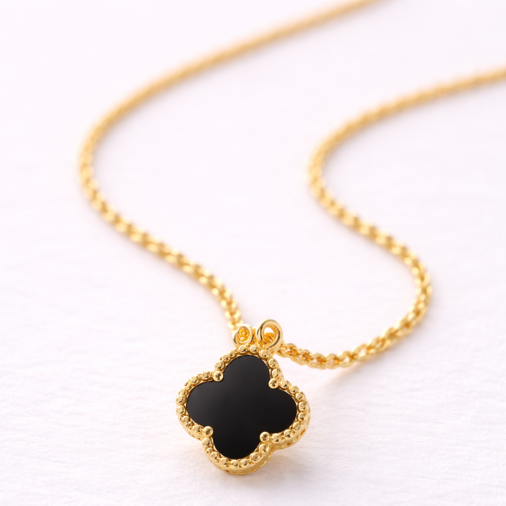 Reversible Clover Pendant Necklace: Anti-tarnish gold plated.