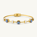 Evil eye kada: Anti-tarnish gold plated.