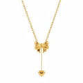 Golden bow heart drop necklace: Anti-tarnish gold plated.