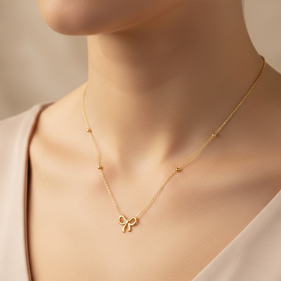 Minimal Bow Necklace: Anti-tarnish gold plated.
