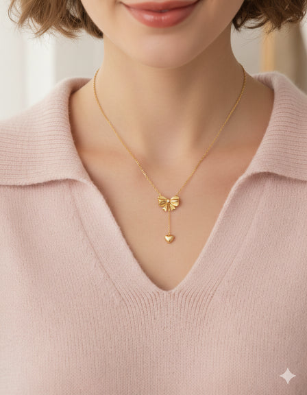 Golden bow heart drop necklace: Anti-tarnish gold plated.