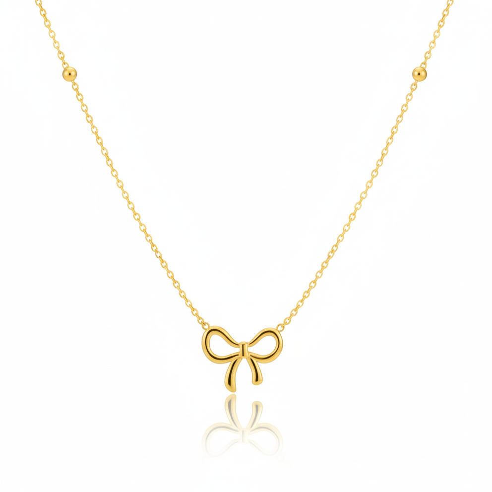 Minimal Bow Necklace: Anti-tarnish gold plated.